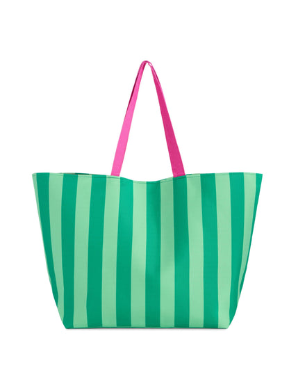 Green striped tote bag with pink handles on a white background
