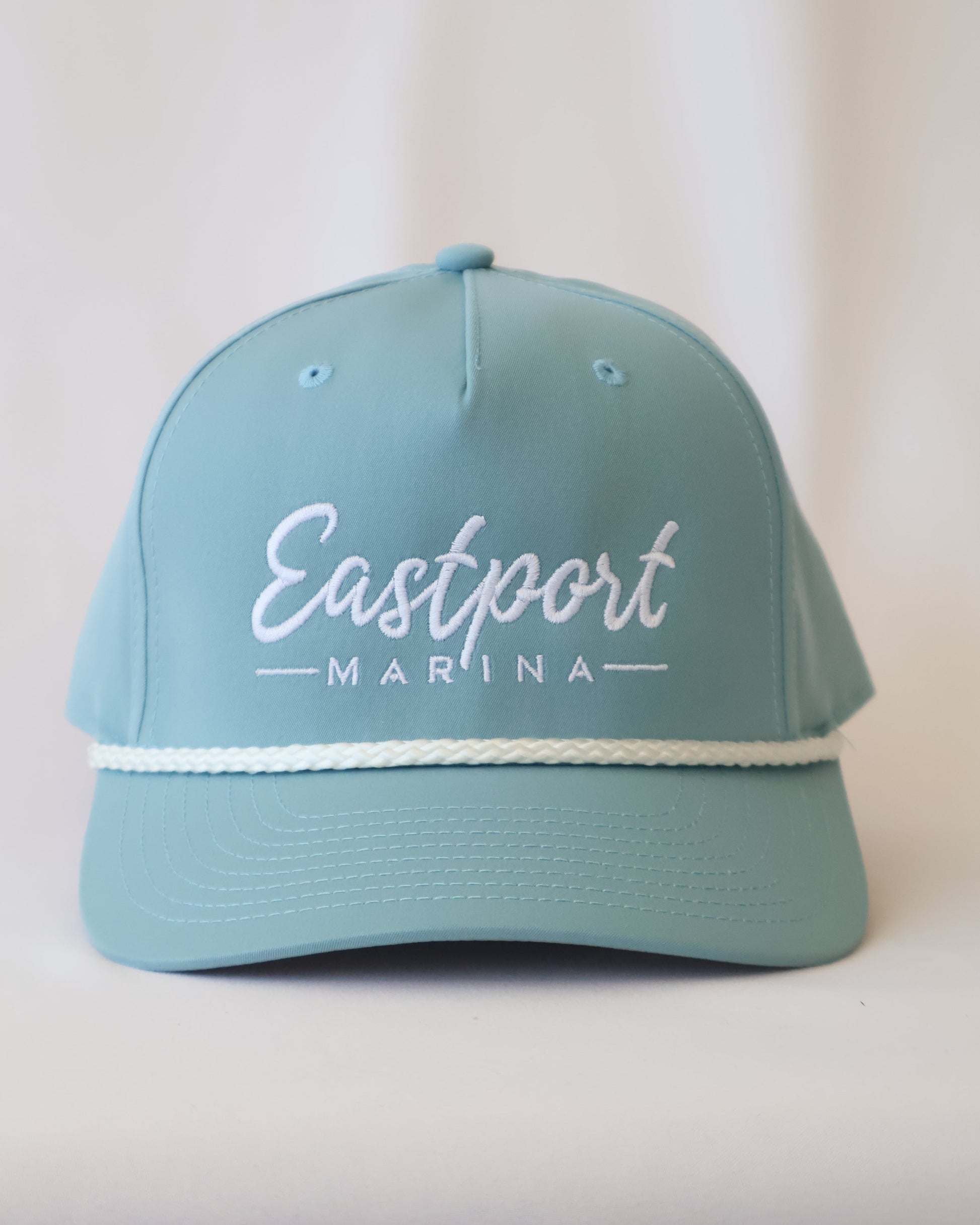 Light blue cap with 'Eastport Marina' text on a white background
