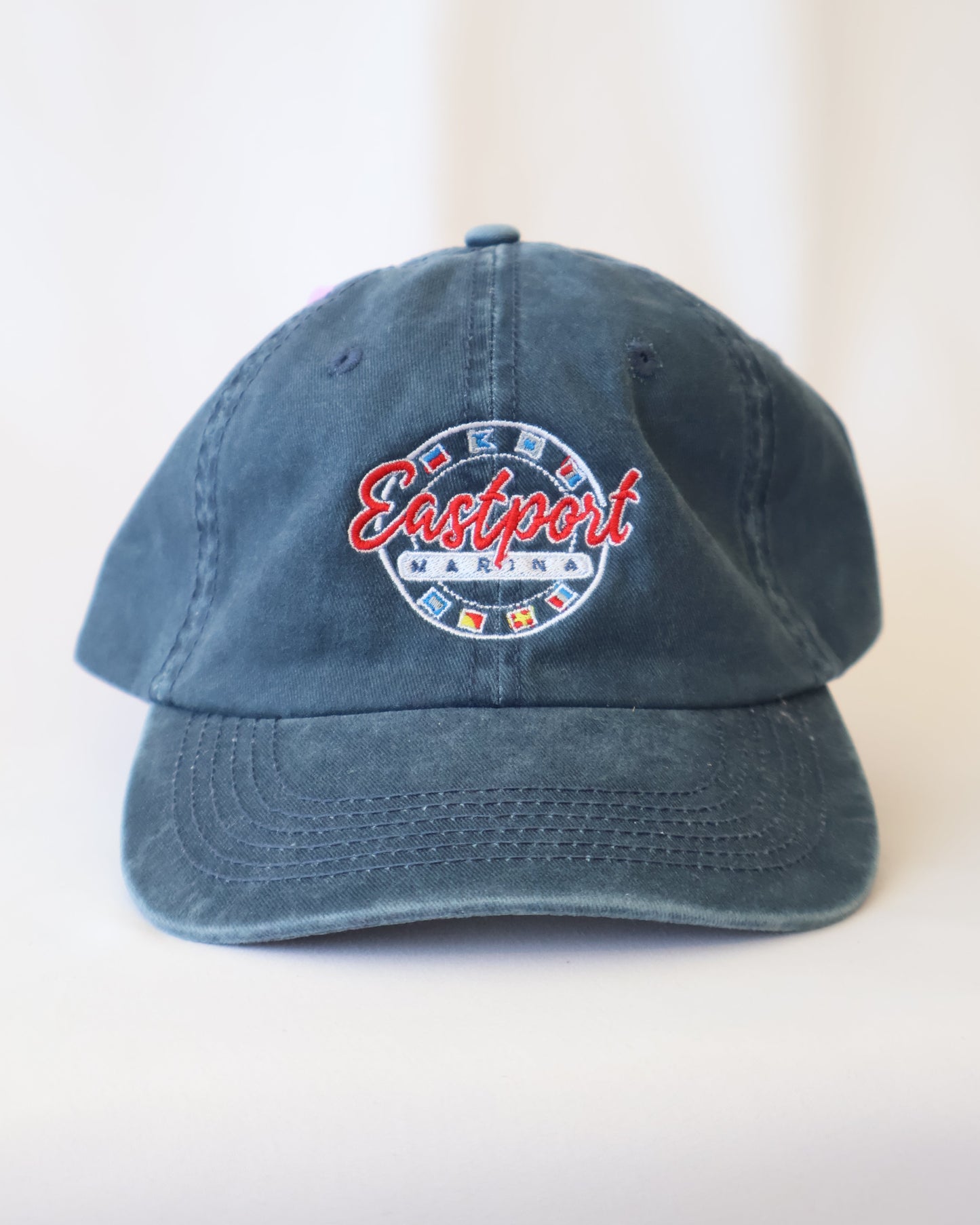 Blue cap with a logo on a white background