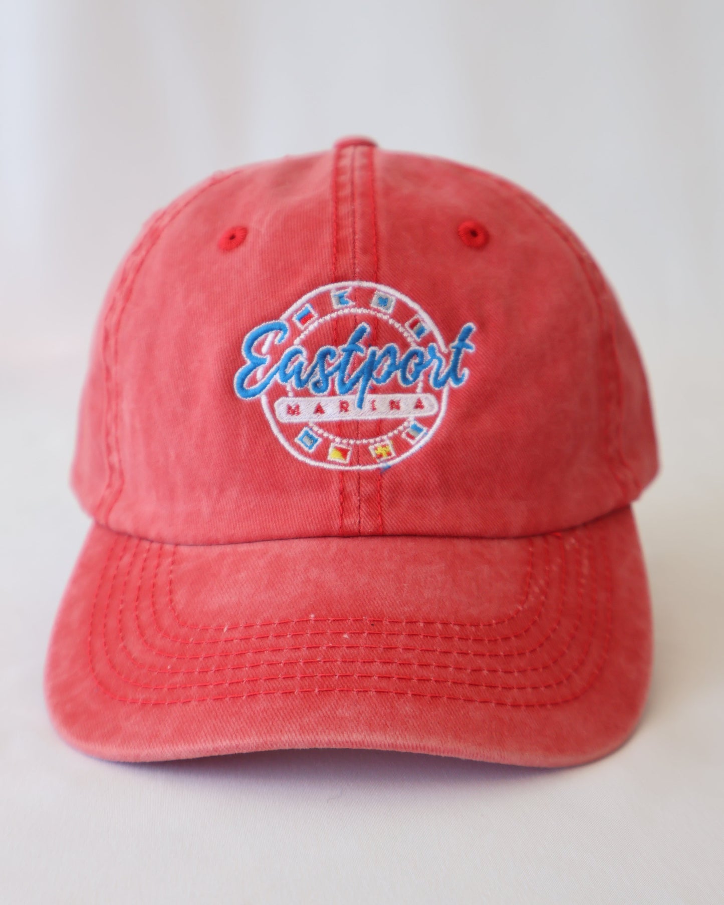 Red hat with a logo on a white background