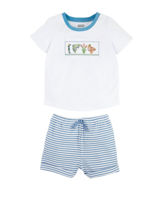 Children's white t-shirt with a colorful graphic and blue striped shorts on a white background