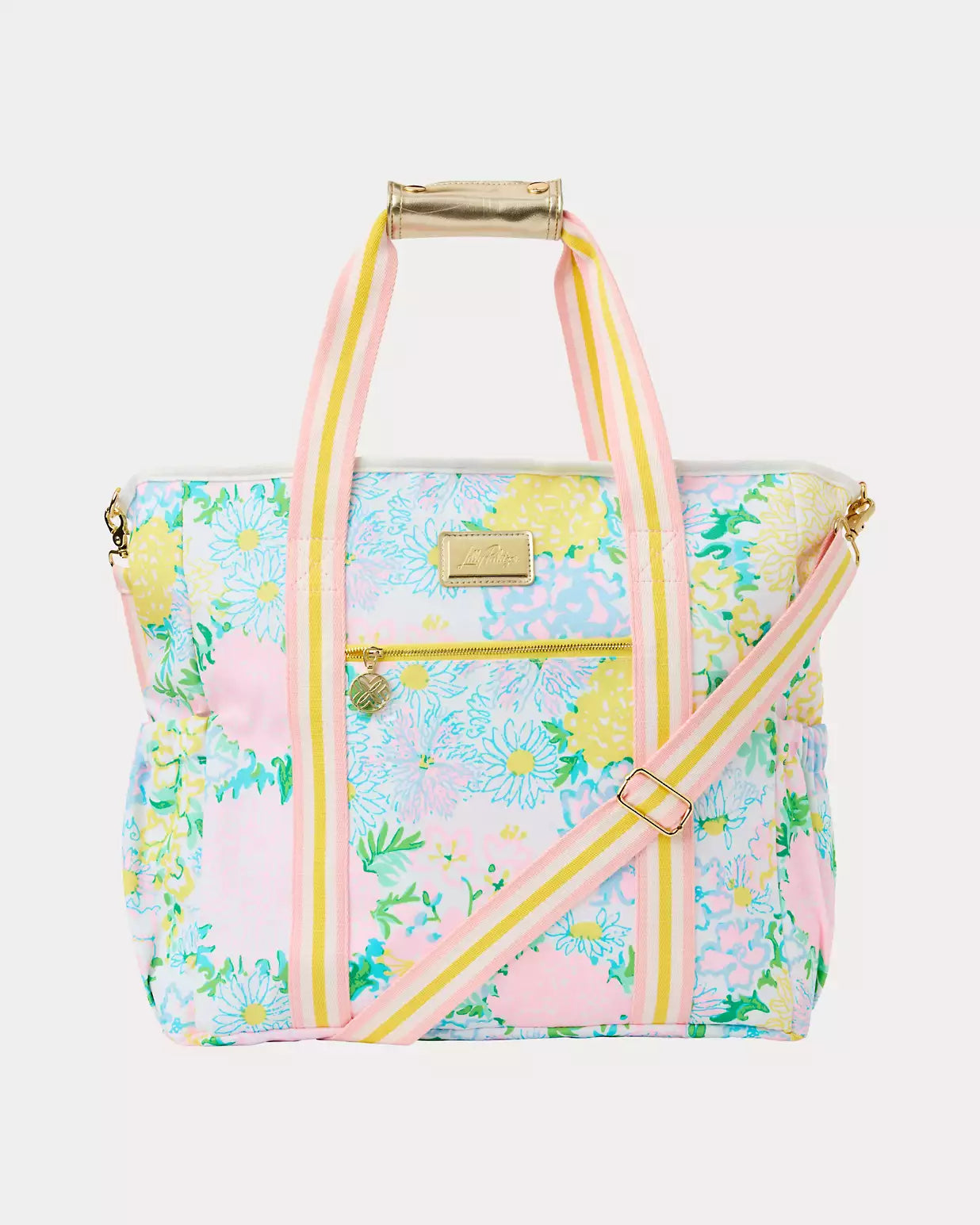 Floral patterned bag with pink straps on a white background