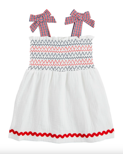 White dress with red and blue accents on a white background